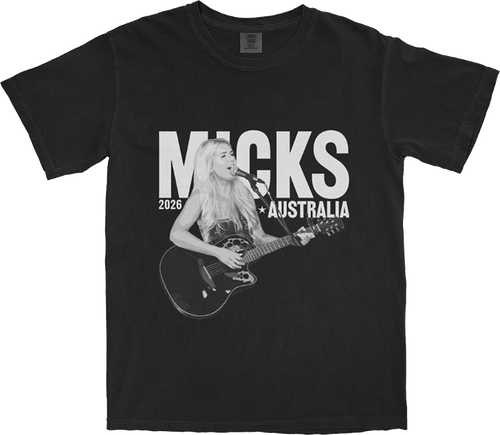 Washed black t-shirt with a live performance photo of Micks and the text 'Micks Australia 2026' in a stylised tour art layout.