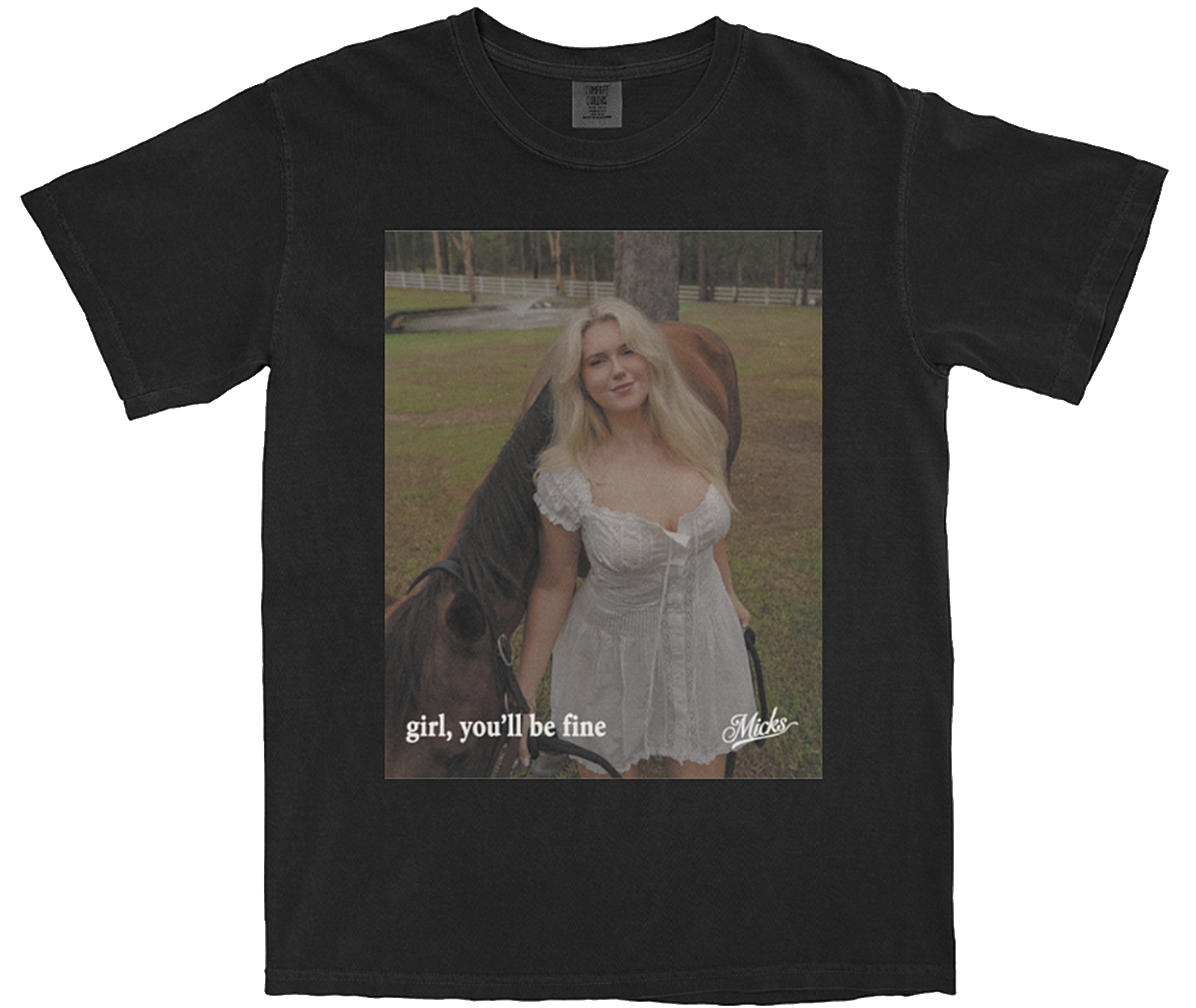 Washed black t-shirt featuring the official 'girl, you'll be fine' single cover art by Micks. The design includes the song title and desert-inspired imagery.